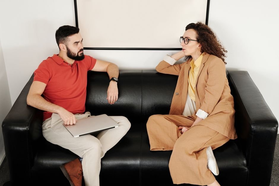 ADA Accommodations for Mental Health at Work: Your Rights, the Process, and the Deadlines 5 Two colleagues talking in an office